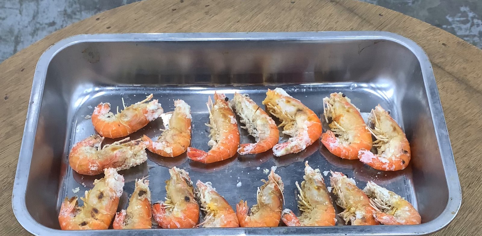 A tray of sixteen salt-baked prawns from a Taiwanese prawn-fishing pool restaurant